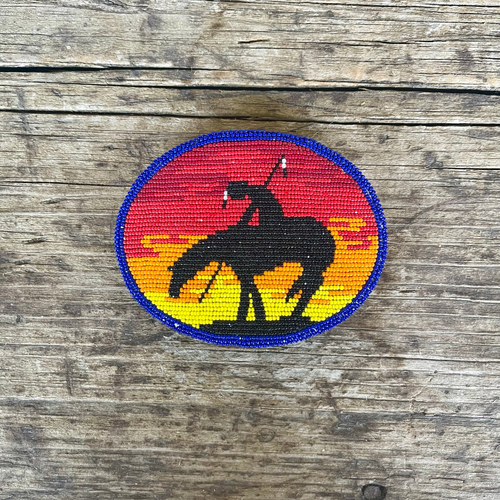 Vintage Native American Oval Beaded Belt Buckle with End of the Trail Design with Sunset Background