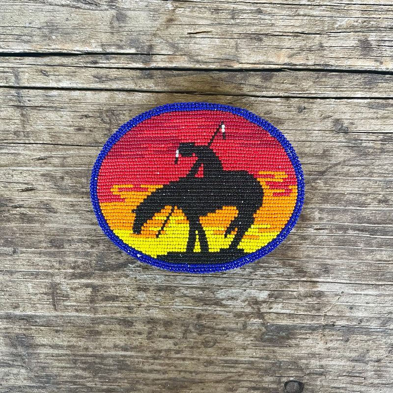 Vintage Native American Oval Beaded Belt Buckle with End of the Trail Design with Sunset Background