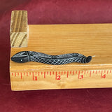 Snake fetish carved with black jet (2/55)