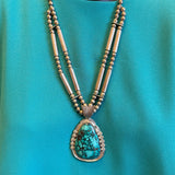 Charlton Draper, Navajo, Navajo silver and turquoise statement necklace with silver beads. JF222