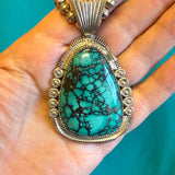 Charlton Draper, Navajo, Navajo silver and turquoise statement necklace with silver beads. JF222