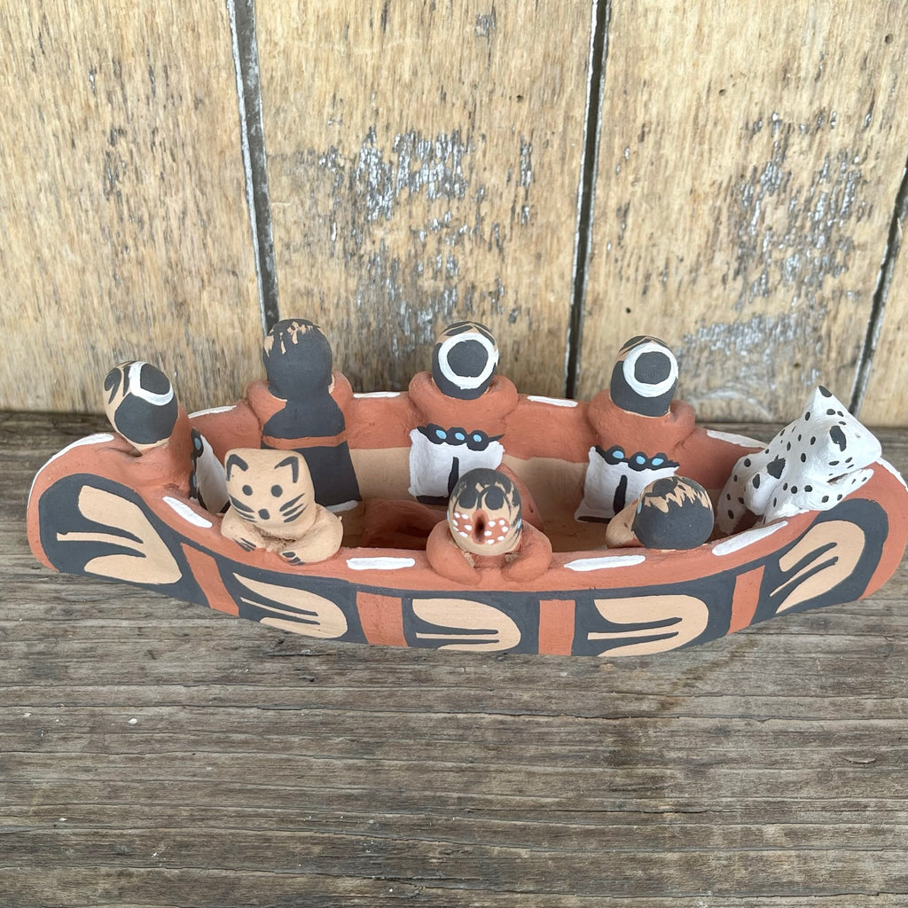 Authentic Native American clay Storyteller canoe with 6 children, 1 cat and 2 dogs. Artist: Helen Sando Garcia, Jemez Pueblo (AR16)