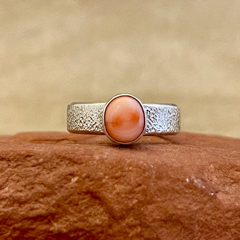 Shaun Rogers, Navajo Textured Silver Ring with Pink Coral Stone - size 7   (4/70)