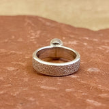 Shaun Rogers, Navajo Textured Silver Ring with Pink Coral Stone - size 7   (4/70)