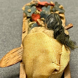 Miniature Native American woman paddling dugout canoe with fabric flowers  (SSC37)