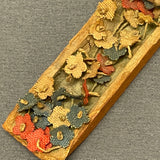 Miniature Native American woman paddling dugout canoe with fabric flowers  (SSC37)