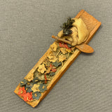 Miniature Native American woman paddling dugout canoe with fabric flowers  (SSC37)