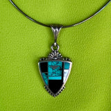 Ray Tracey, Navajo inlay with black jet, turquoise and mother of pearl (PZ8)