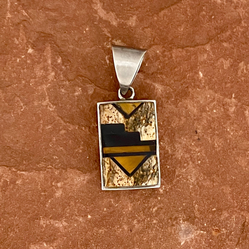 Navajo inlay pendant with black jet, picture jasper and tiger eye/ Reversible with dancer on other side - Made by Supersmith (PZ12)