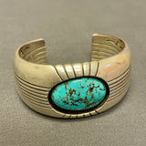 Gene and Martha Jackson, Navajo Bracelet with Large Turquoise Stone and Carved Detailing   (SP51)