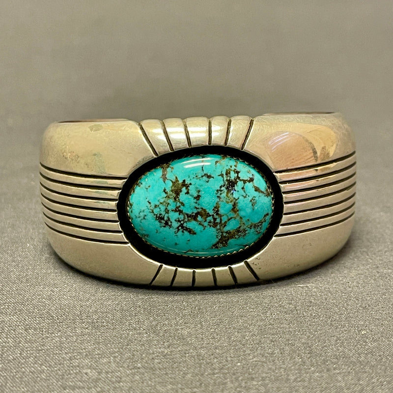 Gene and Martha Jackson, Navajo Bracelet with Large Turquoise Stone and Carved Detailing   (SP51)
