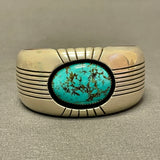 Gene and Martha Jackson, Navajo Bracelet with Large Turquoise Stone and Carved Detailing   (SP51)