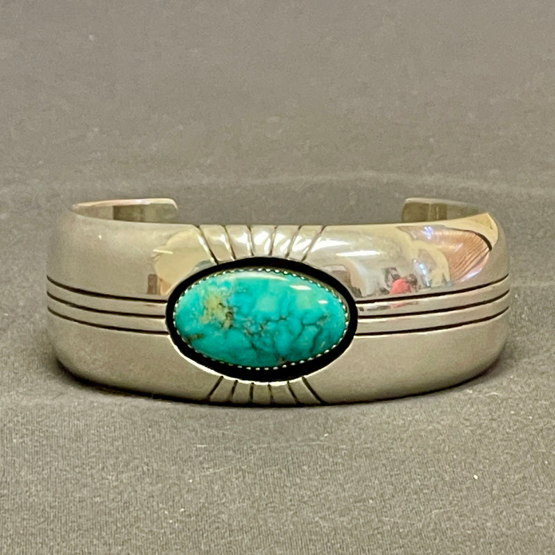 Gene and Martha Jackson, Navajo Bracelet with Large Turquoise Stone and Carved Detailing   (SP50)