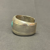 Gene and Martha Jackson, Navajo Bracelet with Large Turquoise Stone and Carved Detailing   (SP51)