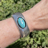 Gene and Martha Jackson, Navajo Bracelet with Large Turquoise Stone and Carved Detailing   (SP50)