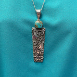Large Alex Sanchez Sterling Silver and Turquoise Pendant with Petroglyph Designs, Zuni/Navajo   (6/74)