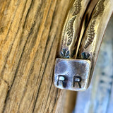 Russ Rockbridge Navajo silver split shank bracelet w stamped designs and stamped raindrops, marked RR for Russ Rockbridge (NLJ1)