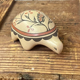 Erlinda Pino, Zia Pueblo turtle pot with flower and butterfly design GM434