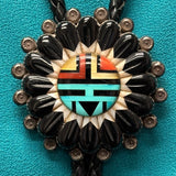 Andrew Dewa Zuni Inlay Sunface Bolo Tie with Carved Jet and Mother of Pearl Eagle Feather Design