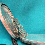Turquoise bolo tie with hinge revealing a hand-cut Navajo scene (JF116)