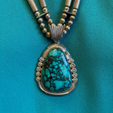 Charlton Draper, Navajo, Navajo silver and turquoise statement necklace with silver beads. JF222