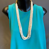 Juan Cate, Santo Domingo olive shell 8 strand heishe necklace with traditional neck wrap (NLJ18)