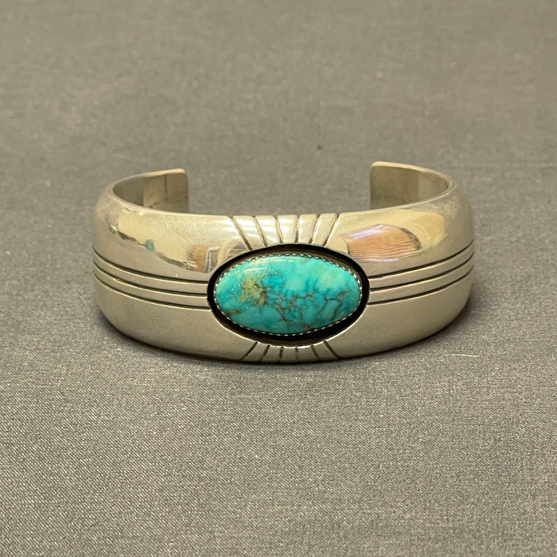 Gene and Martha Jackson, Navajo Bracelet with Large Turquoise Stone and Carved Detailing   (SP50)