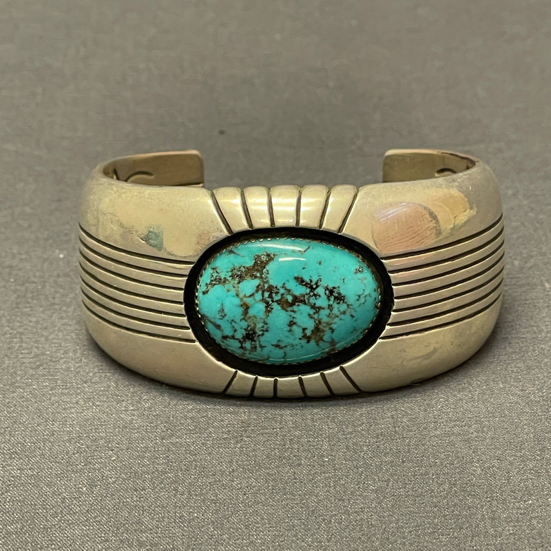 Gene and Martha Jackson, Navajo Bracelet with Large Turquoise Stone and Carved Detailing   (SP51)