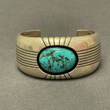 Gene and Martha Jackson, Navajo Bracelet with Large Turquoise Stone and Carved Detailing   (SP51)