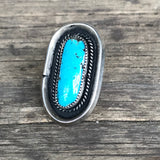 Large oval authentic Navajo ring with blue green turquoise stone  KD221