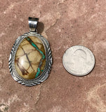 Will Denetdale, Boulder or Ribbon Turquoise Navajo Pendant, Sterling silver Navajo pendant with Bould)er TQ, by W Denatdale (1/257)